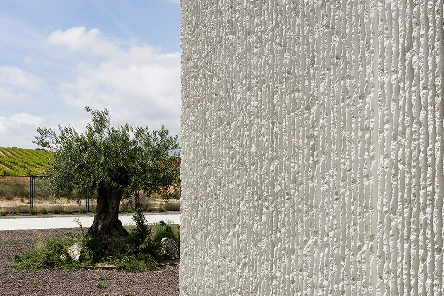 detalle fachada con Cerramiento Artepref con acabado texturizado